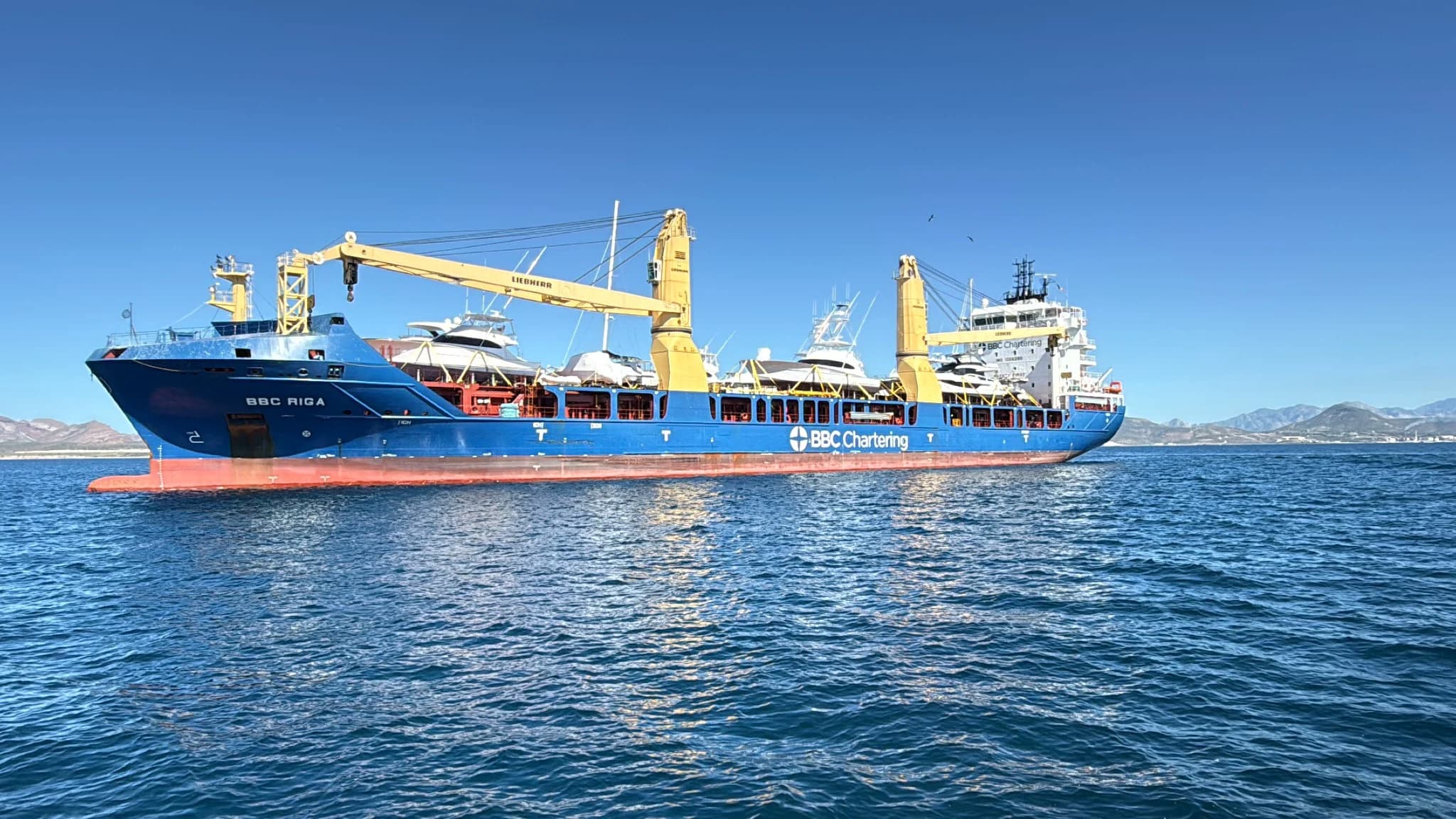 BBC Riga carrying yachts off the coastline of La Paz, Mexico